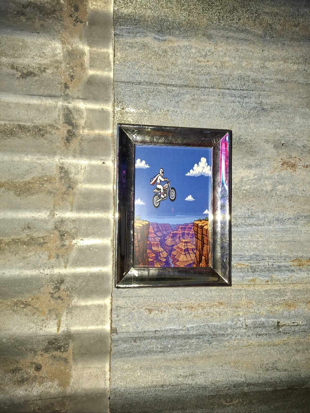 8 Bit Evel Knievel Jumping Grand Canyon Framed Art Print By Neon Nicho